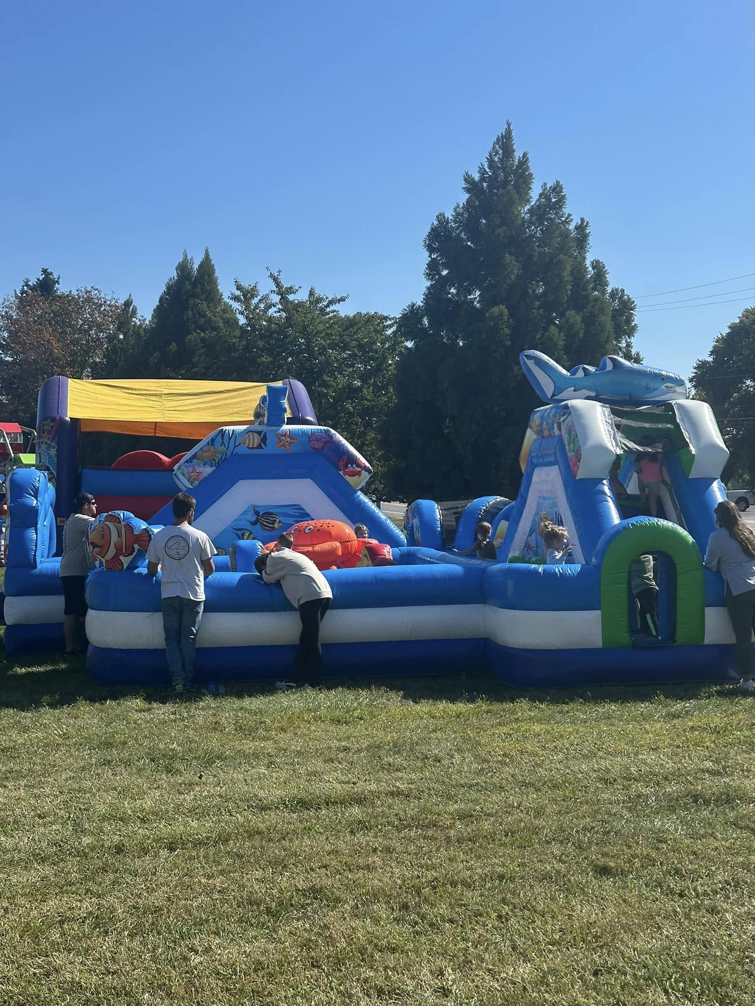 A large inflatable obstacle course on the festival field