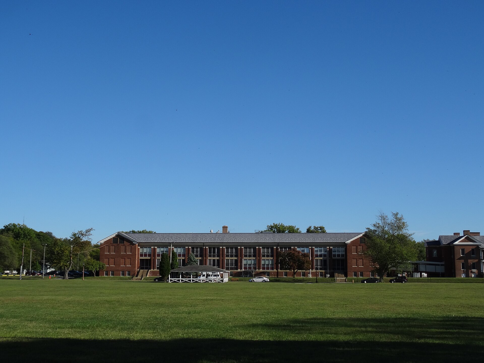 The green parade grounds at Fort DuPont in Delaware City