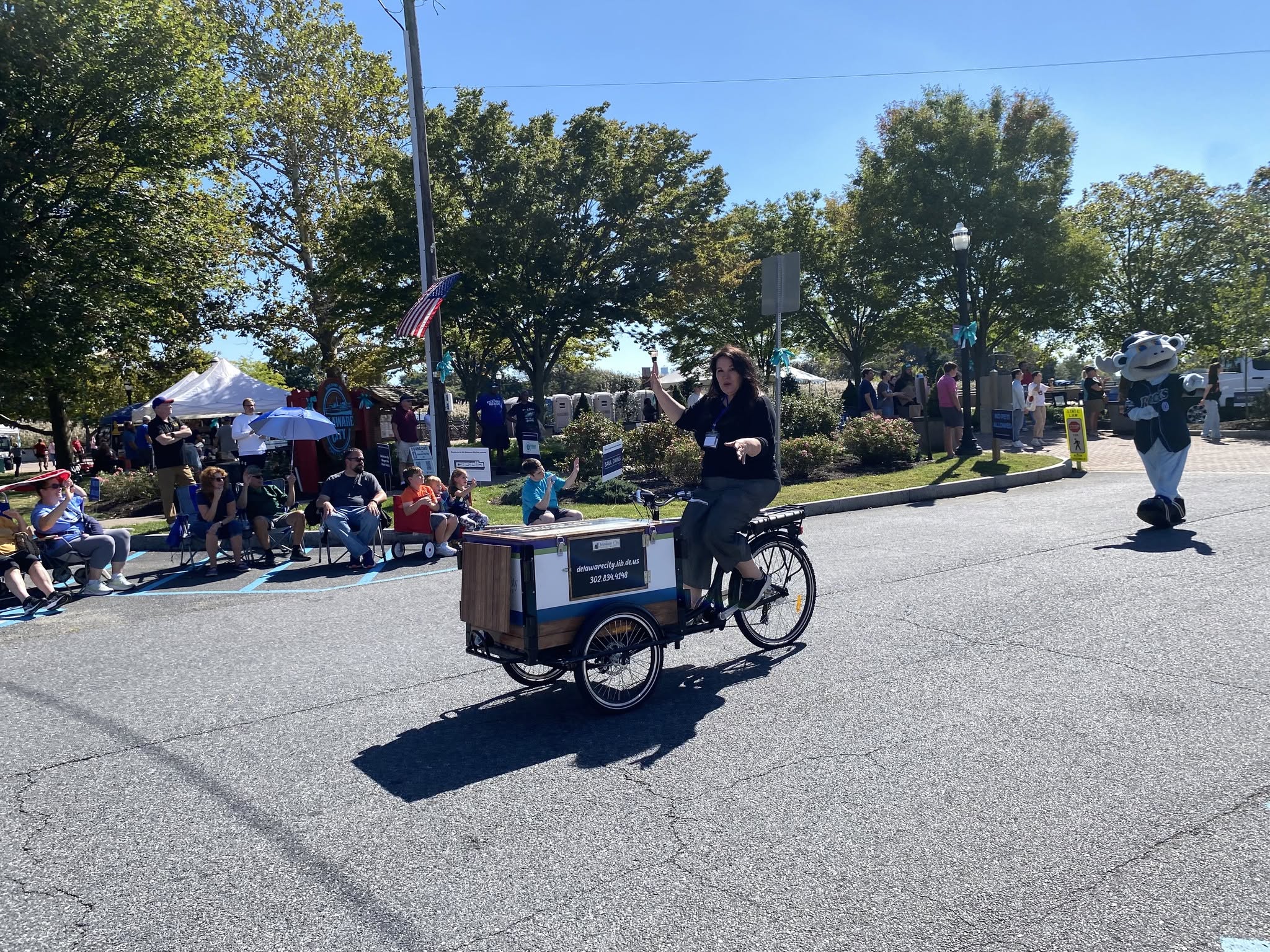 A cargo tricycle ridden down the parade route